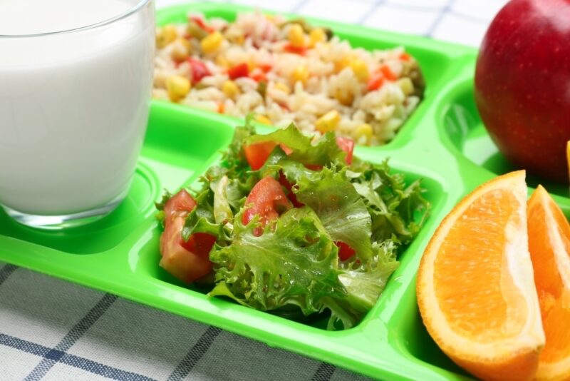 Serving tray with delicious food, closeup. Concept of school lun